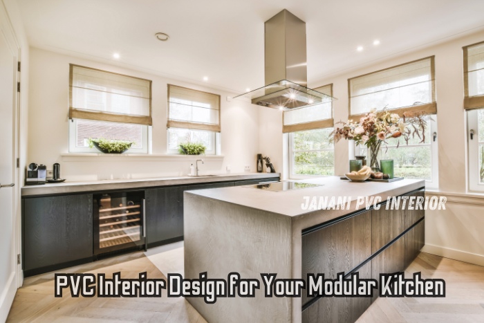 Modern and sleek modular kitchen designed by Maran PVCInterior in Bengaluru, featuring elegant black cabinetry and a spacious island, perfect for enhancing the functionality and style of your home with top-notch PVC interior solutions