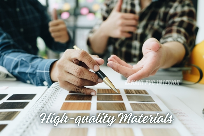 Professional consultation at Maran PVCInterior in Bengaluru, showcasing a selection of high-quality materials. Two experts discussing and choosing from various wood and PVC samples for custom interior projects, emphasizing the commitment to quality and customer satisfaction